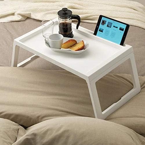 Folding bed table
